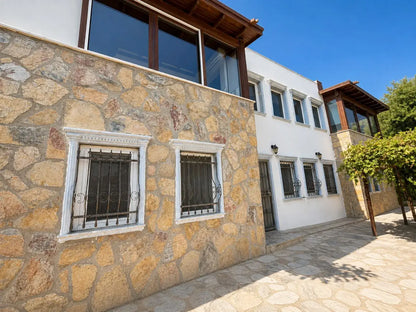 Strandvilla mit Meeresblick in Gümüşlük, in Bodrum