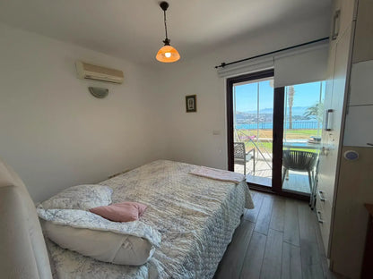 Erdgeschosswohnung mit Meerblick in Yalıkavak, Bodrum